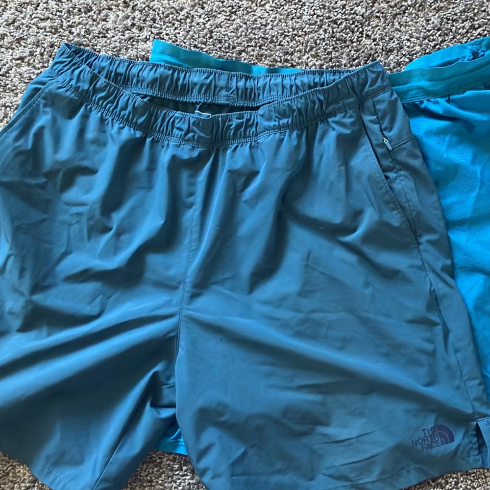2 pairs of North Face blue Men's Running Shorts